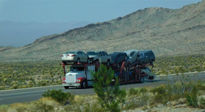 Getsemani hauling trucks on the interstate